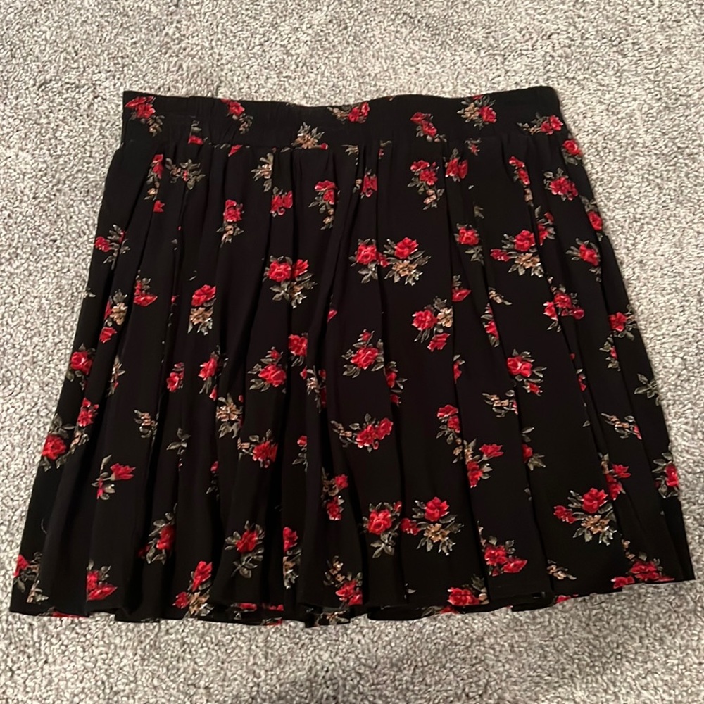 never before worn Brandy Melville black floral mini skirt one size
